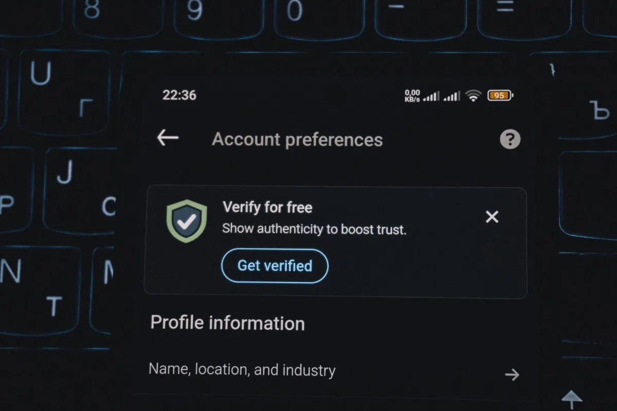 An annotated domain registrar account screen with the business owner's name and email circled as registrant contact