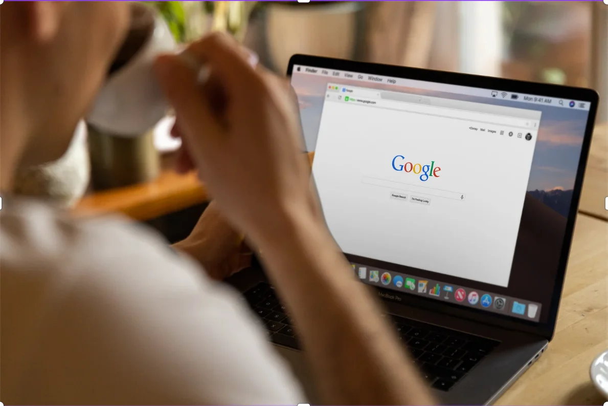 Google Ads search results on a laptop