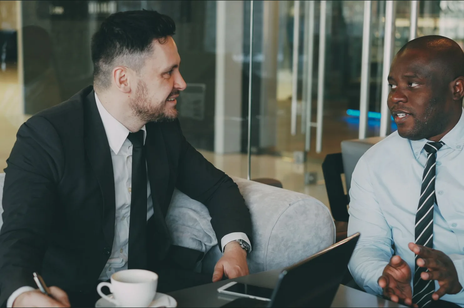 Marketing consultant discussing strategy with a business owner